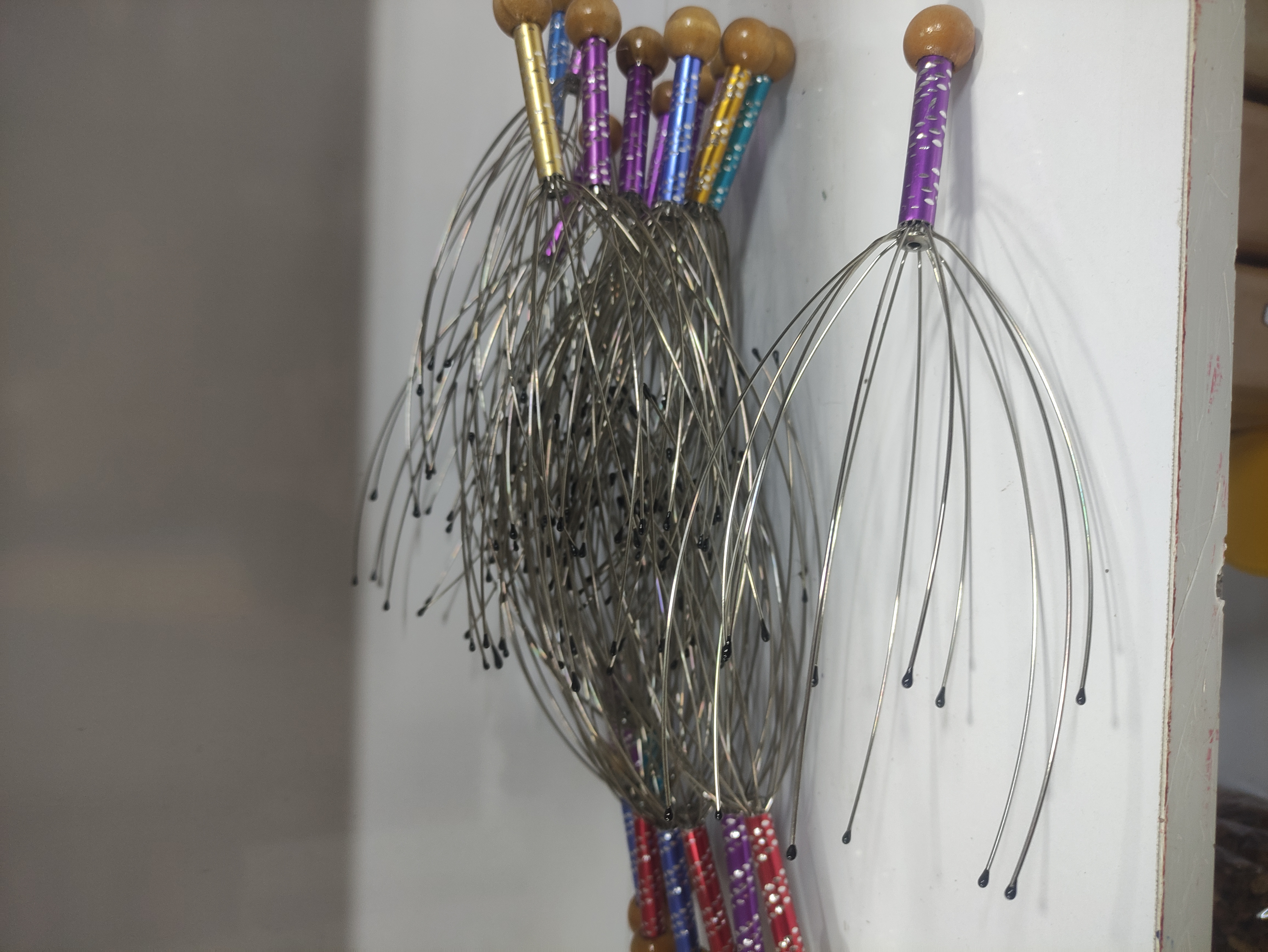 تصویر ماساژور دستی سر 